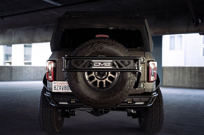 DV8 Offroad Bronco | Spare Tire Guard & Accessory Mount (2021-2025)